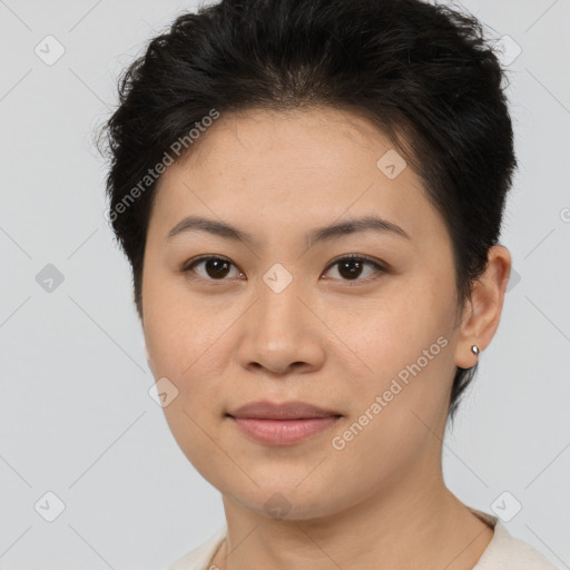 Joyful asian young-adult female with short  brown hair and brown eyes