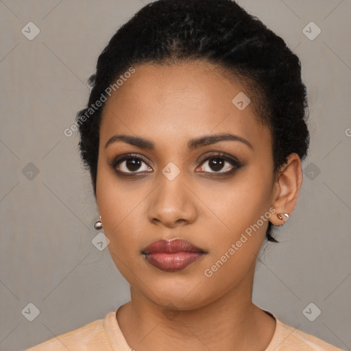 Joyful latino young-adult female with short  black hair and brown eyes