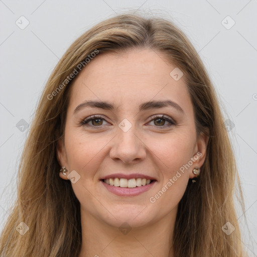 Joyful white young-adult female with long  brown hair and grey eyes