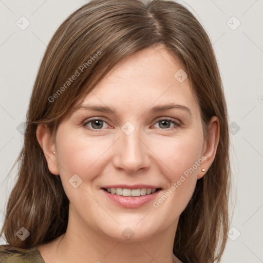 Joyful white young-adult female with medium  brown hair and grey eyes