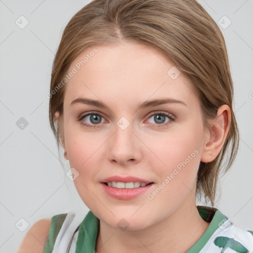 Joyful white young-adult female with medium  brown hair and blue eyes