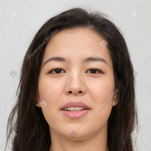 Joyful asian young-adult female with long  brown hair and brown eyes