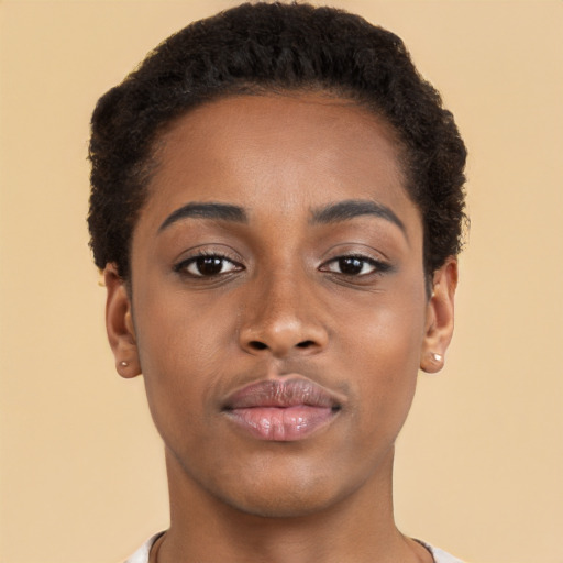 Neutral black young-adult female with short  brown hair and brown eyes