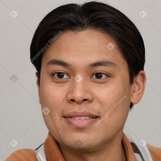 Joyful asian young-adult male with short  brown hair and brown eyes