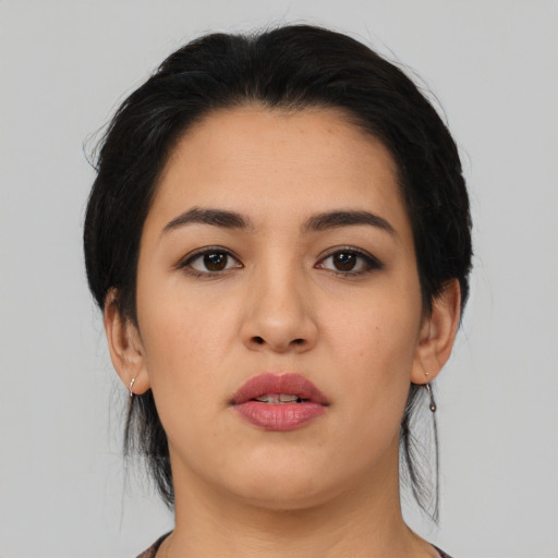 Neutral asian young-adult female with medium  black hair and brown eyes