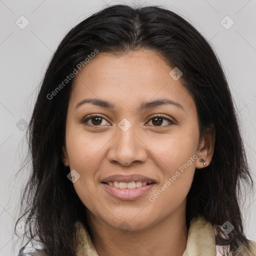 Joyful latino young-adult female with long  brown hair and brown eyes