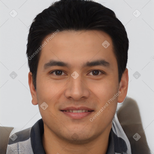 Joyful asian young-adult male with short  black hair and brown eyes