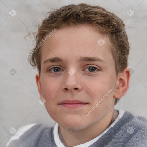 Joyful white child male with short  brown hair and grey eyes