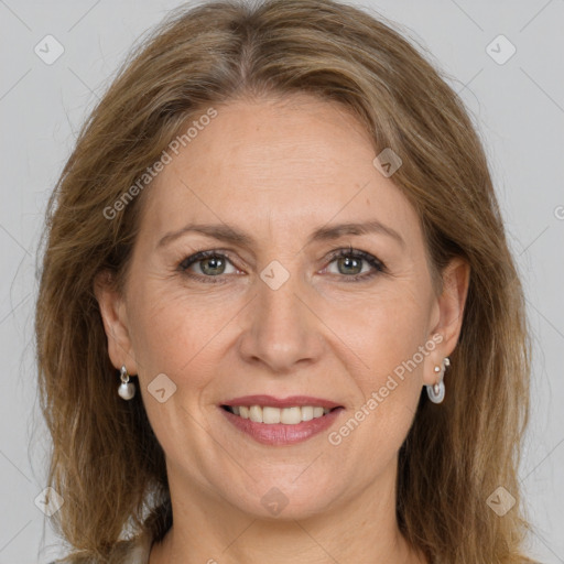 Joyful white adult female with medium  brown hair and grey eyes