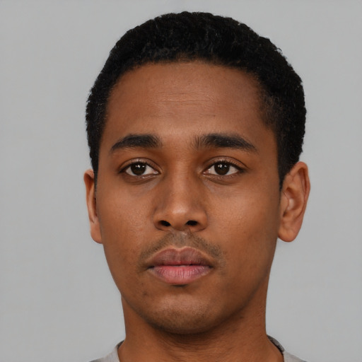 Neutral black young-adult male with short  black hair and brown eyes