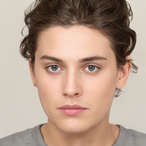 Neutral white young-adult female with short  brown hair and brown eyes