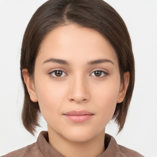 Neutral white young-adult female with medium  brown hair and brown eyes