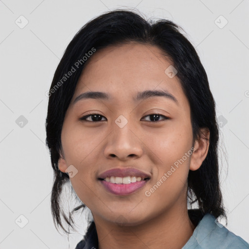 Joyful asian young-adult female with medium  black hair and brown eyes