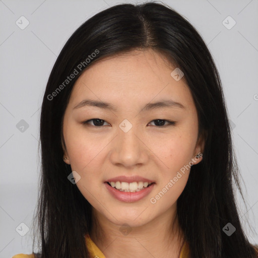 Joyful asian young-adult female with long  brown hair and brown eyes