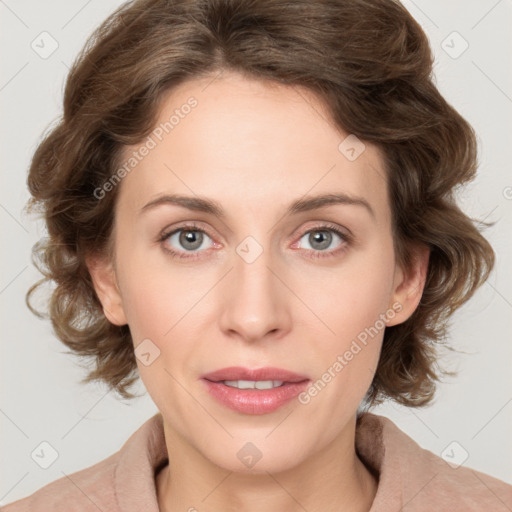 Joyful white young-adult female with medium  brown hair and green eyes