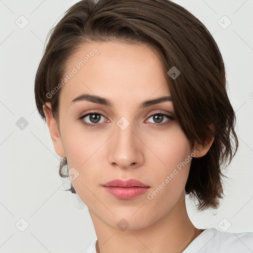 Neutral white young-adult female with medium  brown hair and brown eyes