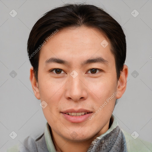 Joyful asian young-adult male with short  brown hair and brown eyes