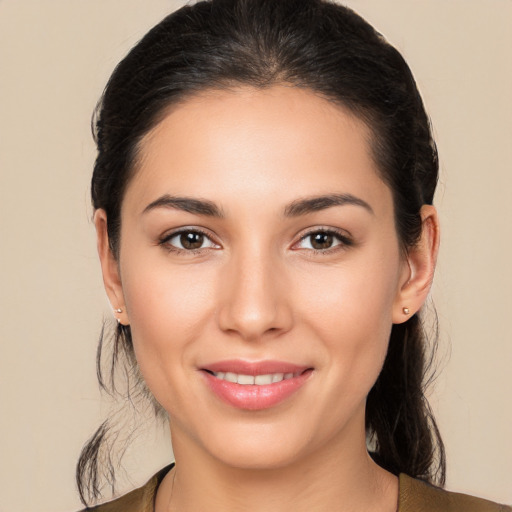 Joyful white young-adult female with medium  brown hair and brown eyes