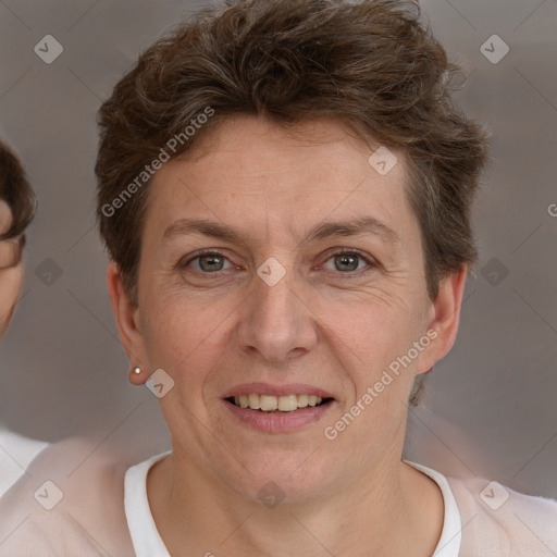 Joyful white adult female with short  brown hair and brown eyes