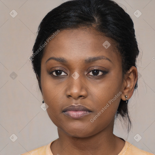 Neutral black young-adult female with medium  black hair and brown eyes