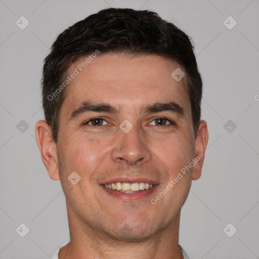 Joyful white young-adult male with short  brown hair and brown eyes