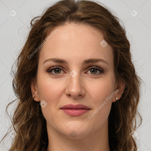 Joyful white young-adult female with long  brown hair and green eyes