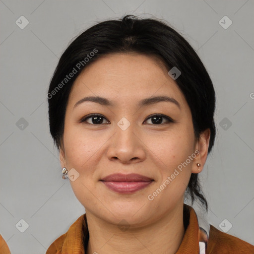 Joyful asian young-adult female with medium  black hair and brown eyes