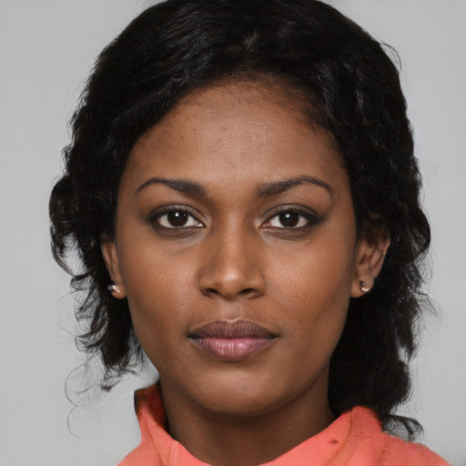 Neutral latino young-adult female with medium  black hair and brown eyes