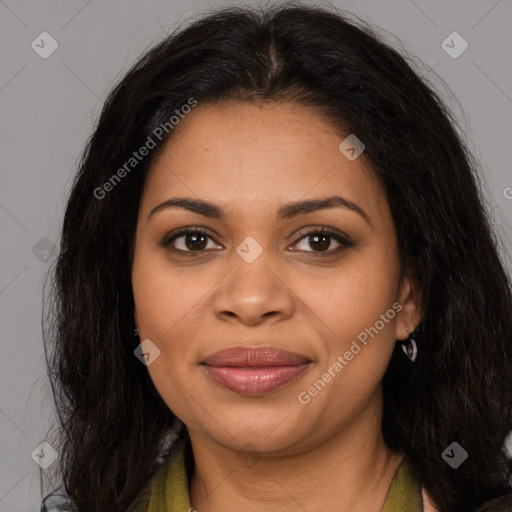 Joyful latino young-adult female with long  brown hair and brown eyes