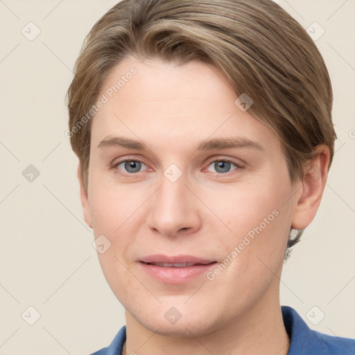 Joyful white young-adult female with short  brown hair and grey eyes