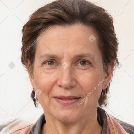 Joyful white adult female with short  brown hair and brown eyes