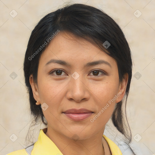 Joyful asian young-adult female with medium  brown hair and brown eyes