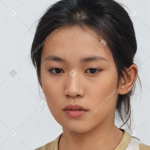 Neutral asian young-adult female with medium  brown hair and brown eyes