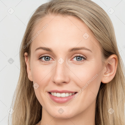 Joyful white young-adult female with long  brown hair and blue eyes