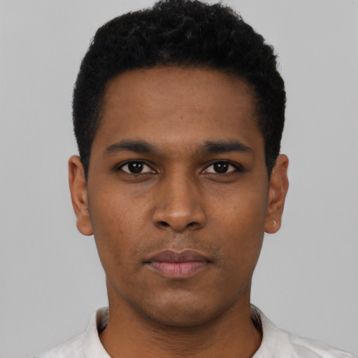 Neutral black young-adult male with short  black hair and brown eyes