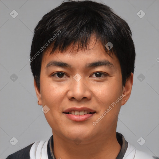 Joyful asian young-adult male with short  black hair and brown eyes