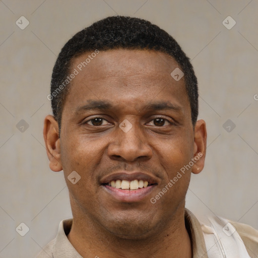 Joyful latino young-adult male with short  brown hair and brown eyes