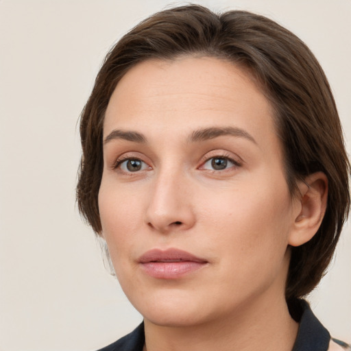 Neutral white young-adult female with medium  brown hair and grey eyes