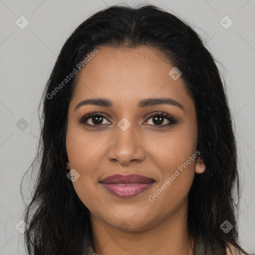 Joyful latino young-adult female with long  brown hair and brown eyes