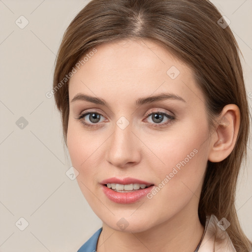 Joyful white young-adult female with long  brown hair and grey eyes