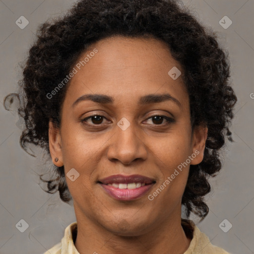 Joyful black young-adult female with medium  brown hair and brown eyes