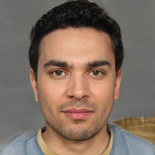 Neutral white young-adult male with short  black hair and brown eyes