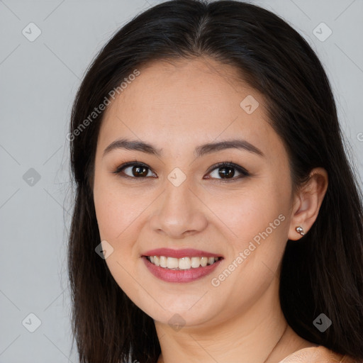 Joyful white young-adult female with long  brown hair and brown eyes