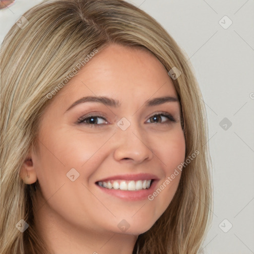 Joyful white young-adult female with long  brown hair and brown eyes