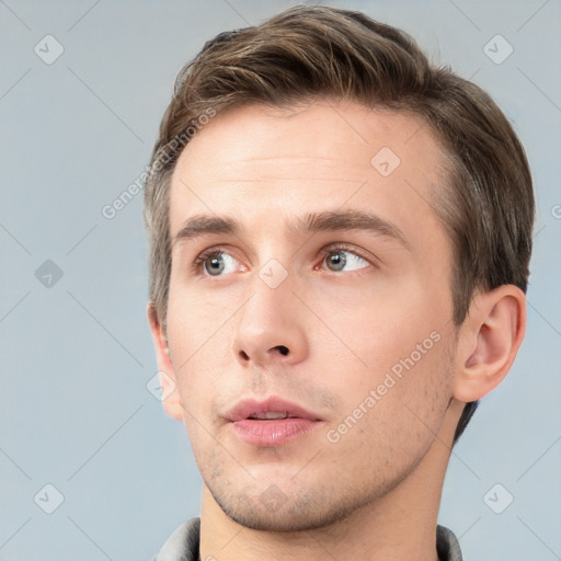 Neutral white young-adult male with short  brown hair and grey eyes