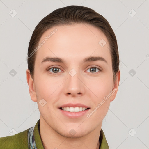 Joyful white young-adult female with short  brown hair and grey eyes