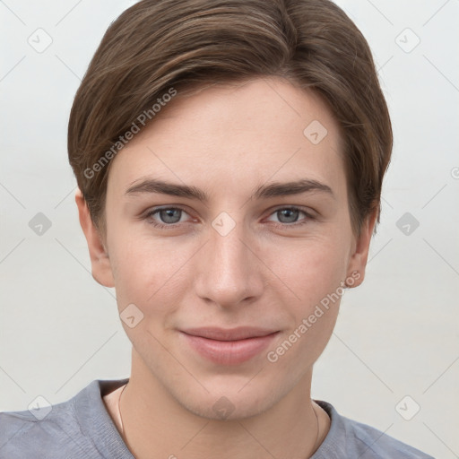 Joyful white young-adult female with short  brown hair and grey eyes