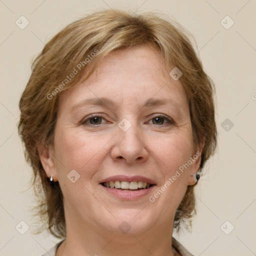 Joyful white adult female with medium  brown hair and grey eyes