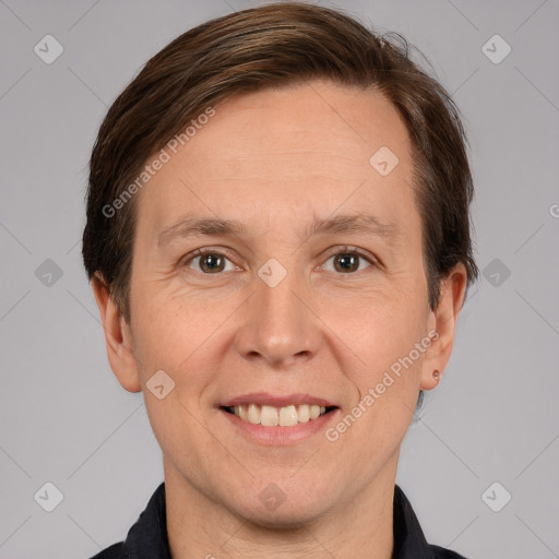 Joyful white adult male with short  brown hair and grey eyes