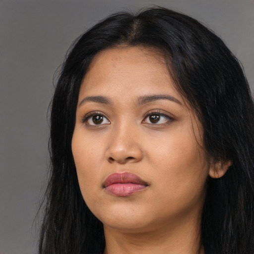 Neutral asian young-adult female with long  black hair and brown eyes